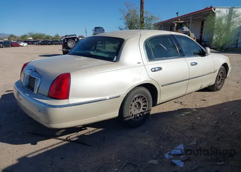 2000 Lincoln Town Car Cartier from USA, damaged, VIN 1LNHM83W1YY837855